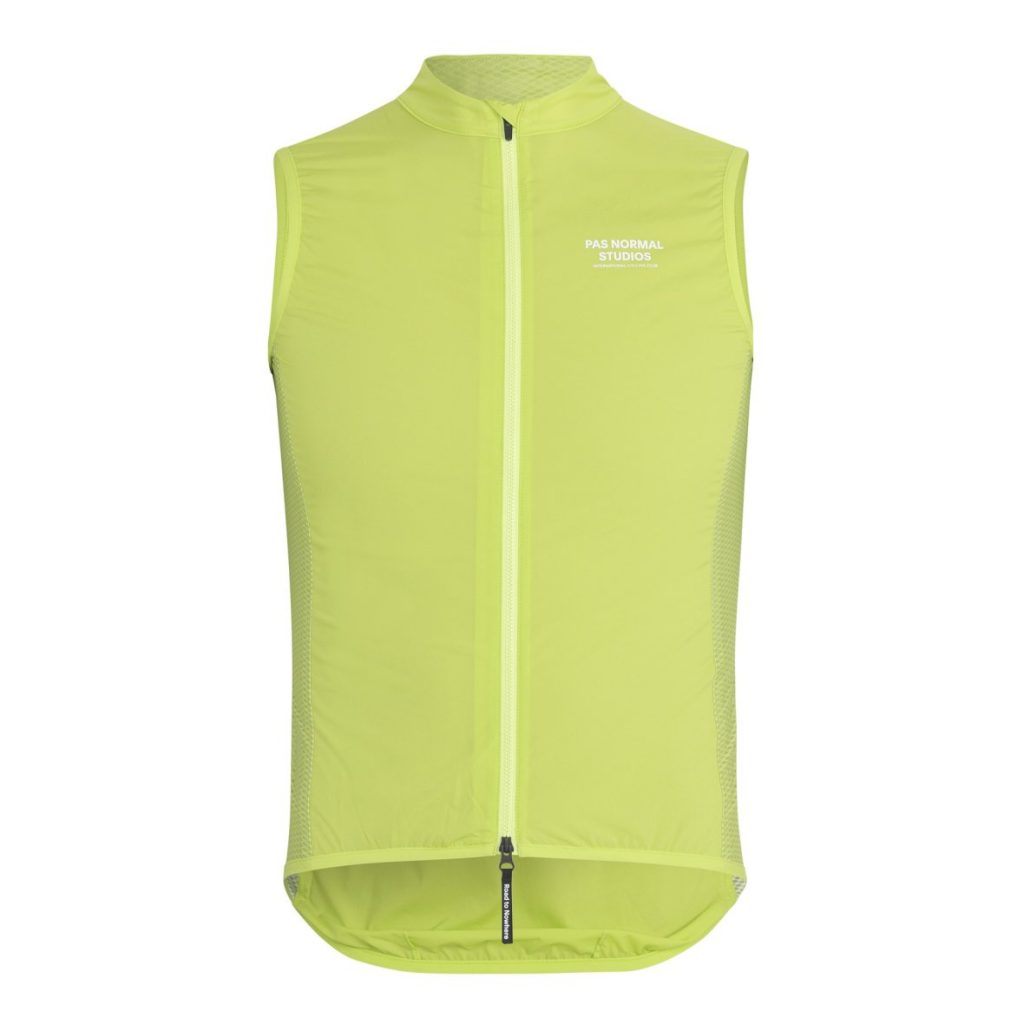 bright lime colored stow away cycling gilet. pas normal studios logo in white print on left chest. 1180w